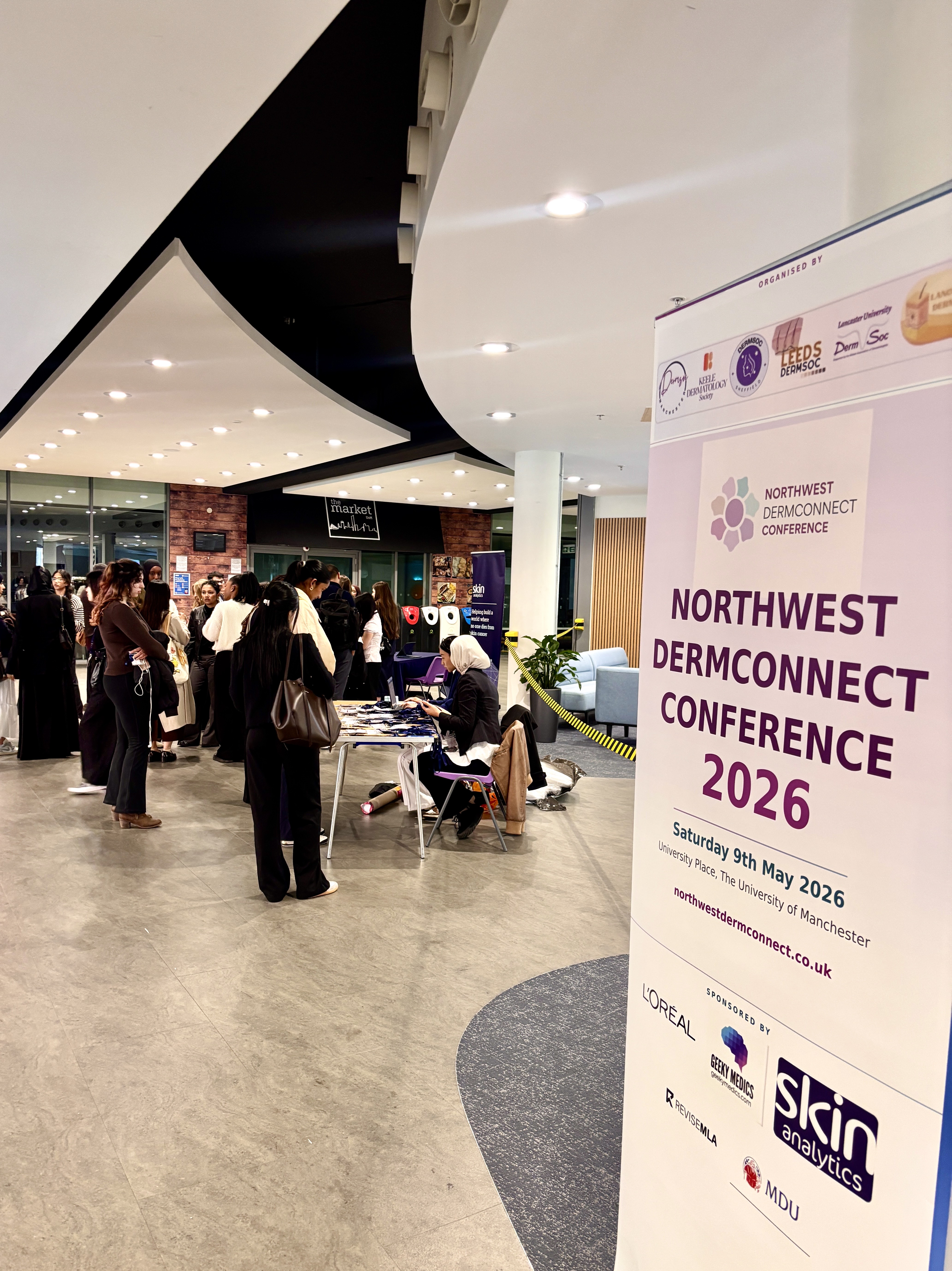 Registration area with conference banner